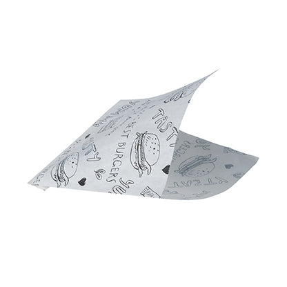 Uma folha de PAPSTAR 1000 sacos de hambúrguer (substituto de pergaminho, resistente a gordura) da PAPSTAR GmbH, branca como papel de jornal, apresenta ilustrações de hambúrgueres pretos, "TASTY", corações e rabiscos, com dois cantos ligeiramente levantados, como se estivessem dobrados ou flutuando.