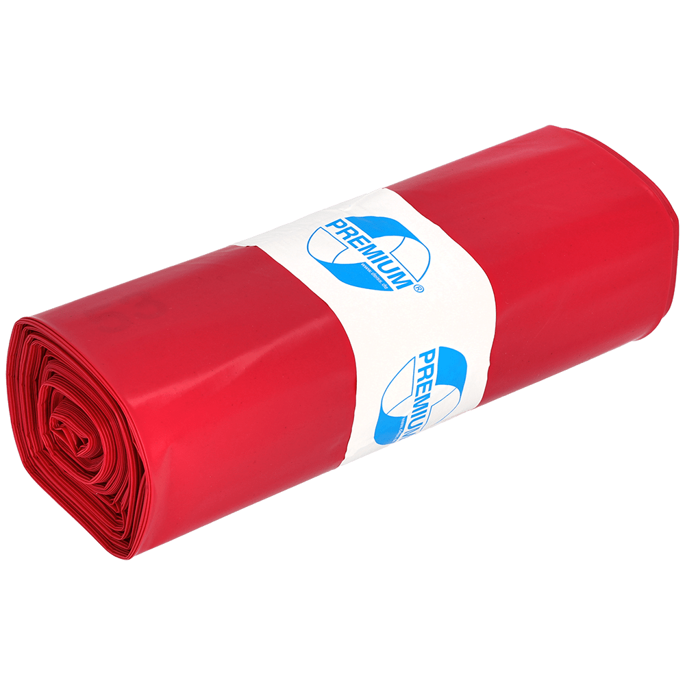 Um rolo de sacos de lixo vermelhos EMIL DEISS KG 11702 (Tipo 100, 575x1000 mm, 25 unidades) com uma etiqueta branca "Premium" em letras azuis; ideal para oficina e canteiro de obras. O produto é mostrado sobre um fundo claro e monocromático.