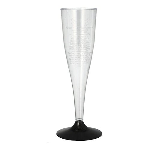 Um copo de pé de espumante Starpak claro (0,1 l, Ø 5 cm, 17,5 cm) de poliestireno com base preta está de pé sobre um fundo branco. A embalagem contém seis copos elegantes com texto vertical discreto na borda.