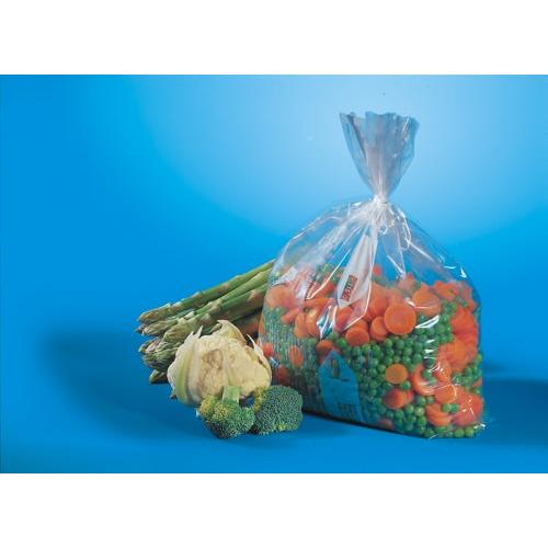 Um saco de congelação transparente Starpak 100 (1 l, 24 cm x 16 cm) contém vegetais mistos congelados e está ao lado de espargos frescos, couve-flor e floretes de brócolos sobre um fundo azul.