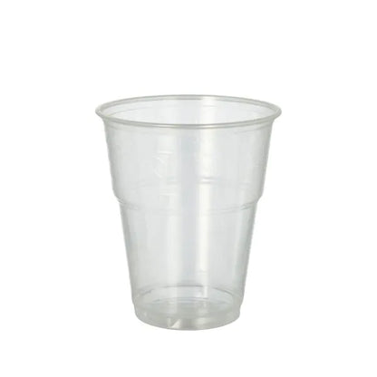 O copo de bebida fria PAPSTAR GmbH 70, PLA "puro" claro como cristal com borda de espuma, é um copo ecológico ideal para servir bebidas frias e está aqui vazio diante de um fundo branco simples.