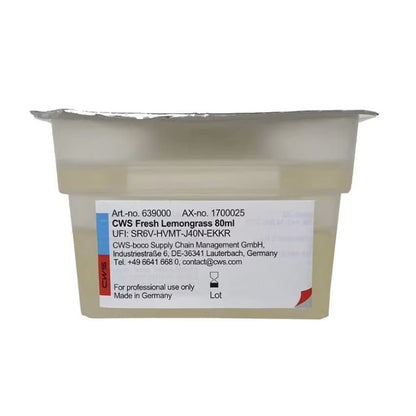 Um recipiente de plástico selado com a inscrição "CWS ParadiseLine Fragrância para Casa de Banho para Dispensador de Fragrâncias Paradise Air Bar" da CWS, com tampa de folha e etiqueta de contato, é destinado apenas ao uso profissional de fragrância para casa de banho.