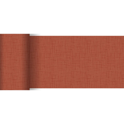 O corredor de mesa Dunicel da Duni GmbH (20 m x 15 cm) apresenta um padrão de cruz texturizado em tom enferrujado ou terracota, parcialmente desenrolado sobre fundo branco - ideal como decoração de mesa.