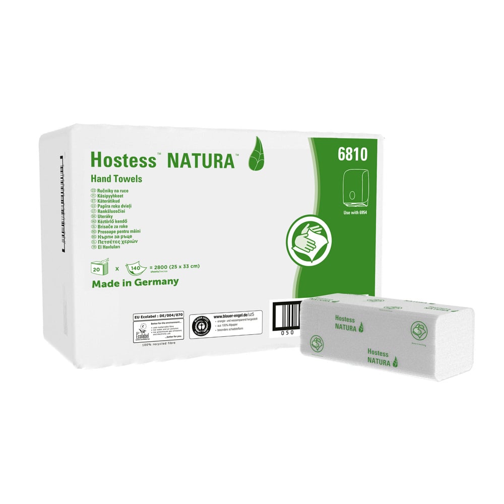 Uma caixa branca de toalhas de mão Hostess™ NATURA™ C-dobra da Kimberly-Clark GmbH está decorada com texto verde e um logotipo de folha e contém 20 pacotes (140 folhas cada). Fabricado na Alemanha, ecológico, com informações sobre o produto e instruções de uso na caixa.