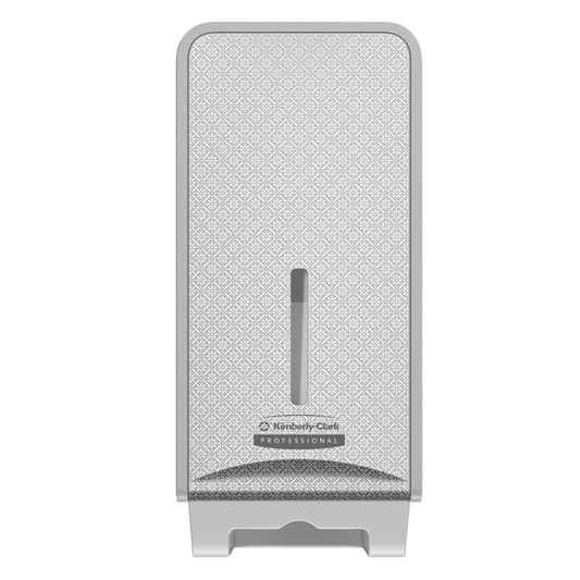 Der Kimberly-Clark Professional™ Icon™ Toilettenpapierspender (gefaltet, 32x14,5x13,8 cm) der Kimberly-Clark GmbH wird an der Wand montiert, hat eine gemusterte Vorderseite, ein vertikales Fenster für den Papierstand und ein dezentes Logo - ideal für jeden Waschraum.