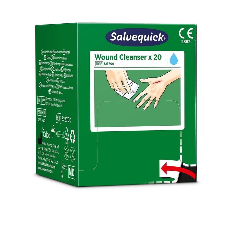 Uma caixa verde com o Salvequick Savett Wundreiniger (0,9 % NaCl, esteril) da Orkla Wound Care AB contém 20 limpadores de feridas estéreis. Na embalagem há um manual de instruções com uma ilustração mostrando uma mão limpando a outra.