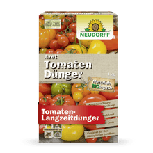 Uma caixa retangular de Azet TomatenDünger da Neudorff Shop com imagens de tomates, marca e texto em alemão destaca a fórmula orgânica para fertilização de longo prazo e colheita abundante de tomates.