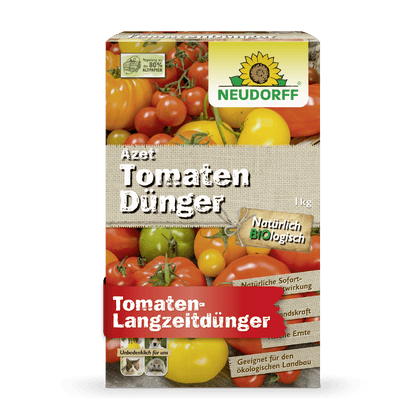 Uma caixa retangular de Azet TomatenDünger da Neudorff Shop com imagens de tomates, marca e texto em alemão destaca a fórmula orgânica para fertilização de longo prazo e colheita abundante de tomates.
