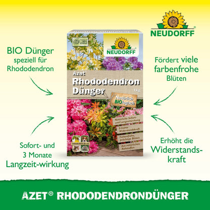 Na imagem está uma caixa de Azet RhododendronDünger da Neudorff Shop com rododendros e azáleas brilhantes na embalagem e a fórmula de adubo orgânico completo para uma floração saudável com efeito imediato e de longa duração.