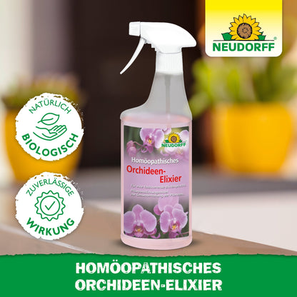 Um frasco de spray com "Elixir Homeopático de Orquídeas" da loja Neudorff, cujo rótulo exibe orquídeas cor-de-rosa. O fundo desfocado mostra vasos amarelos e plantas verdes. Um produto de cuidado ideal para orquídeas.