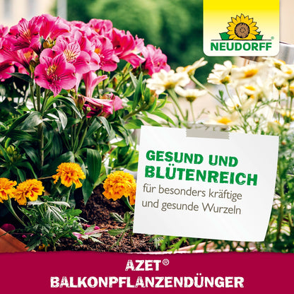 É mostrado um vaso de flores com flores de verão rosa e amarelas. Um cartaz promove o Neudorff Shop Azet Fertilizante Líquido para Plantas de Varanda para flores saudáveis em caixas de varanda. O logotipo da Neudorff está no canto superior direito.