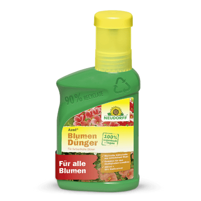 A garrafa verde-amarela Azet BlumenDünger líquida da Neudorff Shop é 100% vegana, promove o crescimento saudável das plantas e mostra flores cor-de-rosa, bem como uma faixa vermelha "Para todas as flores".