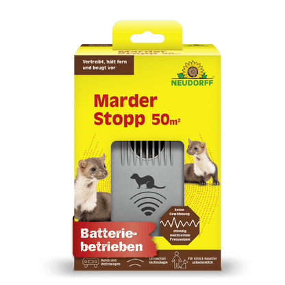 Uma caixa amarelo-verde Neudorff Shop MarderStopp 50m² mostra marta, texto do produto alemão e um dispositivo cinza de bateria em uma janela frontal. Ícones destacam características como tecnologia de ultrassom para proteção eficaz de cabos.