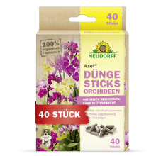 Uma caixa de Azet Düngesticks para orquídeas da Neudorff Shop, que é marcada como 100% biológica, contém 40 sticks, está com texto em alemão, mostra flores exóticas e o logotipo de girassol amarelo da Neudorff.