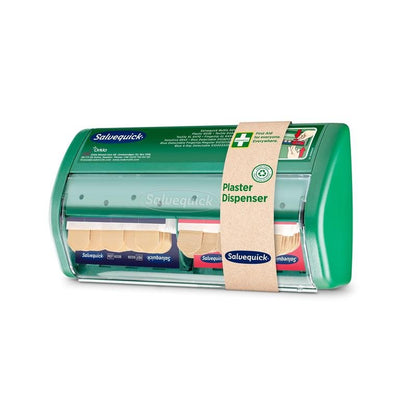 O dispensador de pensos Salvequick da Orkla Wound Care AB | Embalagem (1 unidade) é um dispensador verde e transparente para pensos com uma faixa de papel bege "Dispensador de Pensos", concebido para um acesso rápido e fácil aos pensos.