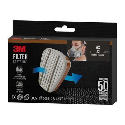 Uma caixa do cartucho de filtro 3M™ 6055, A2 Vapores Orgânicos da 3M Deutschland GmbH, com a imagem de um cartucho, um usuário mascarado e o texto indicando que é para vapores orgânicos (A2), compatível com máscaras 3M; um cartucho por caixa.