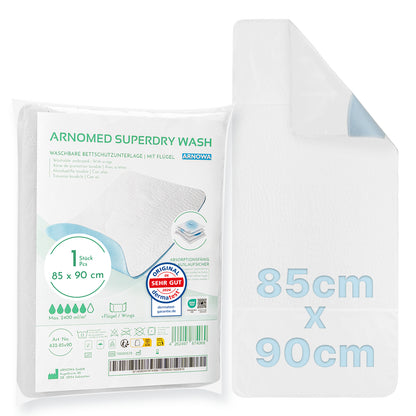 Uma almofada de proteção de cama lavável ARNOMED com abas, Superdry (1 peça, 85x90 cm) da ARNOWA GmbH embalada e não dobrada; a embalagem mostra informações do produto e um selo azul de certificação para proteção de cama em caso de incontinência.