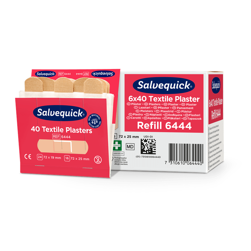 Uma caixa aberta de Orkla Wound Care AB Textilgesso, 40 unid./Recarga está ao lado de uma embalagem fechada (6 peças), onde vários pensos bege para cuidados de feridas são visíveis.