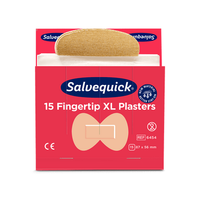 Uma caixa vermelha de Orkla Wound Care AB XL Pensos de Tecido para Pontas dos Dedos, 15 unidades/Mina (embalagem de 6 unidades), com um penso parcialmente removido. Na embalagem estão o símbolo CE, as dimensões e uma imagem da forma das pontas dos dedos.