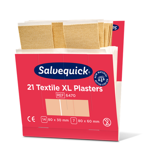 Eine rosa-weiße Schachtel von Orkla Wound Care AB mit der Aufschrift "Xl textilgips, 21 Stück/mine | Packung (6 Stück)" enthält große Gewebepflaster in zwei Größen: 80x30 mm und 80x60 mm. Oben auf der offenen Schachtel sind mehrere beigefarbene Pflaster zu sehen.