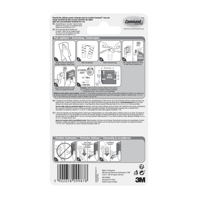 No verso de uma embalagem da 3M Deutschland GmbH Pequenas Tiras Command™ S, 17022N, há instruções ilustradas e multilíngues sobre como aplicar e remover tiras adesivas sem pregos, para manter as paredes sem danos, além de um código de barras na parte inferior.