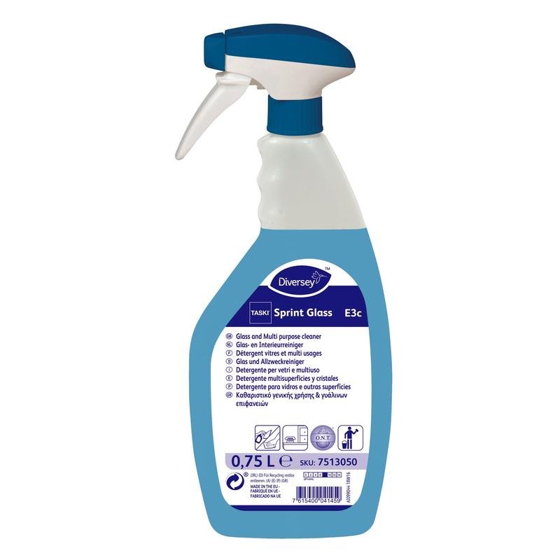 Um frasco de spray branco e azul TASKI Sprint Glass Limpa-vidros e superfícies da Diversey Deutschland GmbH & Co. OHG, 0,75 l, para limpeza sem manchas, com informações sobre o produto e instruções de uso no rótulo.