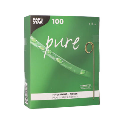 Uma caixa verde da PAPSTAR GmbH com a inscrição "pure" contém 100 palitos de finger food (11 cm) – perfeito para festas. Na embalagem está ilustrado um espeto de bambu e um close-up de um caule verde e fresco.
