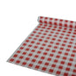 Um rolo de toalha de mesa Starpak, 50 m x 80 cm em padrão xadrez vermelho, é parcialmente desenrolado sobre uma superfície plana. O material é folha de plástico.
