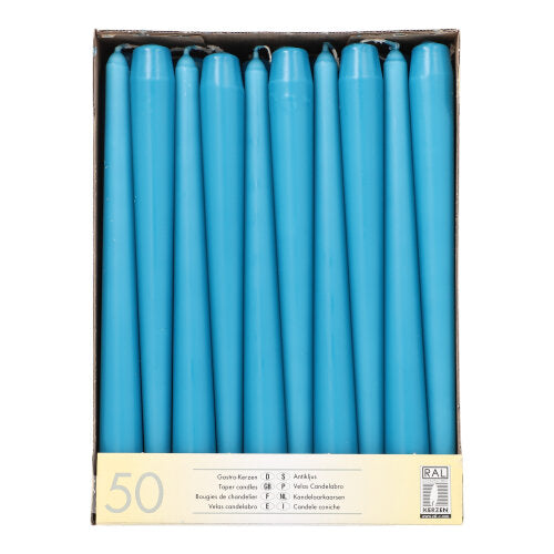 Uma caixa com 50 velas Starpak (Ø 2,2 cm - 25 cm) em duas filas, com longa duração de queima e uma etiqueta bege com informações de quantidade e produto multilíngue na parte inferior.