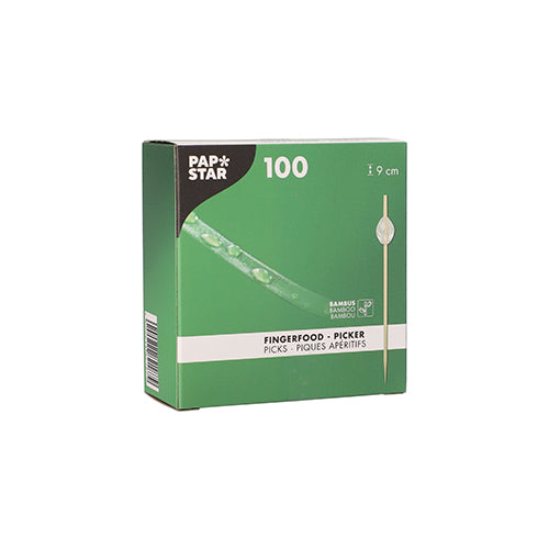 Uma caixa verde da PAPSTAR GmbH com a inscrição "PAPSTAR 100 Fingerfood - Picker" contém 100 palitos de bambu com um comprimento de 9 cm cada. A embalagem mostra uma imagem do palito e informações do produto em vários idiomas.