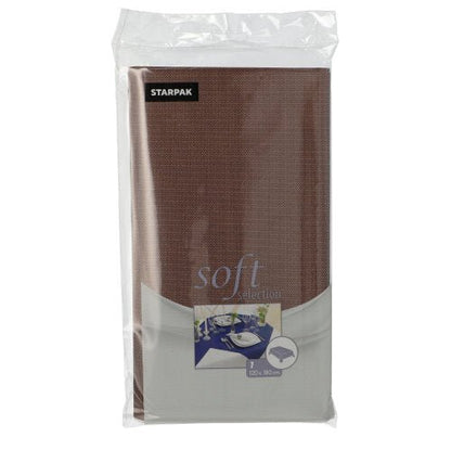 É mostrado um pacote embrulhado em filme da toalha de mesa Starpak, semelhante a tecido, tecido não tecido "soft selection" 120 cm x 180 cm. A embalagem transparente permite ver uma toalha de mesa marrom e uma etiqueta frontal com detalhes do produto.