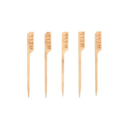 Cinco PAPSTAR 250 marcadores de bife de 9 cm da PAPSTAR GmbH, cada um com a gravação "WELL", estão alinhados em fila, ideal para restaurantes para identificar claramente bifes bem passados.