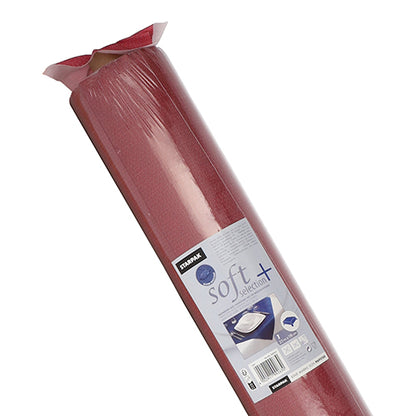 Um rolo de toalha de mesa Starpak, semelhante a tecido, em "soft selection plus" vem em uma embalagem plástica com informações do produto e imagens que mostram seu uso estiloso e durável - semelhante a uma toalha de mesa de tecido para uso único.