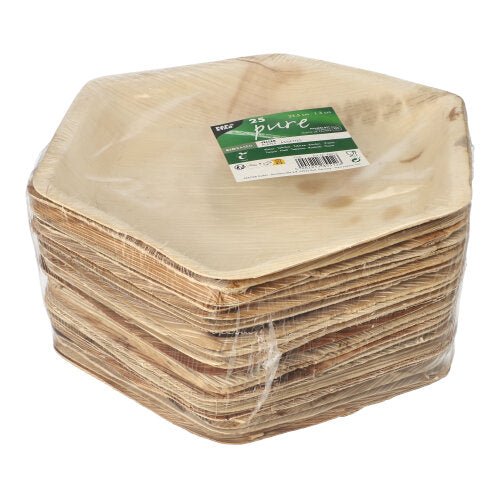 Um conjunto de pratos de folha de palma PAPSTAR "puros" hexagonais, 23,5 cm (25 peças) feitos de folha de palma natural em filme retrátil com rótulo verde e branco - louça descartável ecológica da PAPSTAR GmbH.