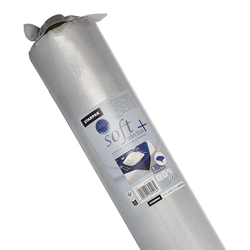 Um rolo de toalha de mesa Starpak, semelhante a tecido, Vlies "soft selection plus" está em pé com uma embalagem com informações do produto e uma imagem de mesa - ideal como uma toalha de mesa durável e versátil ou Vlies.