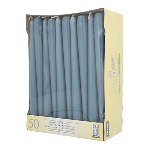 Uma caixa bege Starpak contém 50 velas cônicas brancas (Ø 2,2 cm - 25 cm) com longa duração. As velas estão dispostas verticalmente em duas filas e visíveis através de uma janela transparente na frente da embalagem.