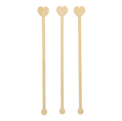 Três PAPSTAR 100 misturadores de bebidas, bambu "pure" da PAPSTAR GmbH estão dispostos verticalmente sobre um fundo branco, demonstrando sua característica ecológica e biodegradável.