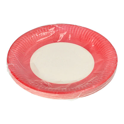 O PAPSTAR 20 pratos, papelão redondo Ø 23 cm da PAPSTAR GmbH tem uma borda vermelha e um centro branco, é entregue em uma embalagem de plástico transparente e é ideal para eventos – aqui ilustrado sobre um fundo branco.