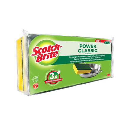 Na imagem está uma embalagem de esponja de limpeza Scotch-Brite® Classic XXL da 3M Deutschland GmbH em embalagem verde com logotipo vermelho e branco e a inscrição "3x poder de limpeza". Duas esponjas amarelo-verdes são parcialmente visíveis no interior da embalagem de 6 unidades.