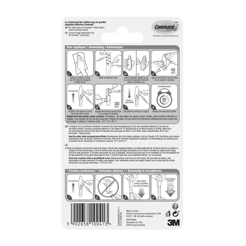 Parte traseira da embalagem dos ganchos de metal Command™ "clássico" (3M Deutschland GmbH) com instruções ilustradas passo a passo em várias línguas para a aplicação e remoção corretas, bem como avisos e informações do produto na parte inferior.