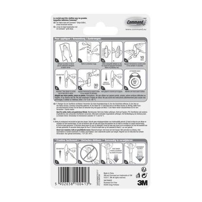 Parte traseira da embalagem dos ganchos de metal Command™ "clássico" (3M Deutschland GmbH) com instruções ilustradas passo a passo em várias línguas para a aplicação e remoção corretas, bem como avisos e informações do produto na parte inferior.