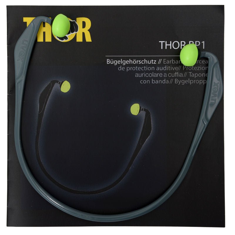 Um par de protetores auriculares cinza Abena Re-Seller GmbH Thor (812010) com pontas de espuma verde descansa sobre uma embalagem multilíngue com a inscrição "Pacote (15 peças)".