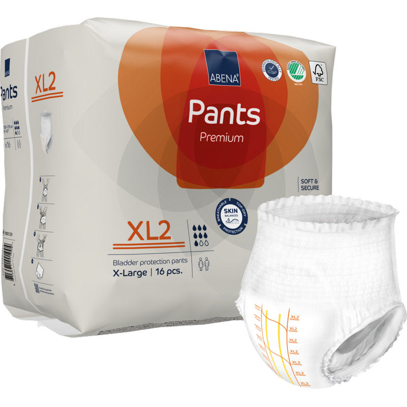 Eine Packung ABENA Pants Premium XL von Abena Re-Seller GmbH, Größe XL2, enthält 16 Stück. Die weiße Packung mit orangefarbenen Akzenten ist mit Zertifizierungslogos versehen, außen ist ein Inkontinenzslip angebracht.