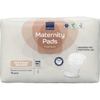 Uma embalagem de ABENA Maternity Pad, Premium da Abena Re-Seller GmbH contém 15 pensos macios e absorventes para o período pós-parto, cujos símbolos de certificação são visíveis na embalagem.
