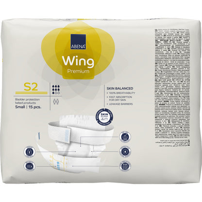 Eine 15er-Packung ABENA Wing Premium der Abena Re-Seller GmbH in der Größe Small hat eine überwiegend weiße Verpackung mit gelben Akzenten, einer Produktinformation, dem Text "Schutz und Komfort" und einer Produktabbildung auf der Vorderseite.