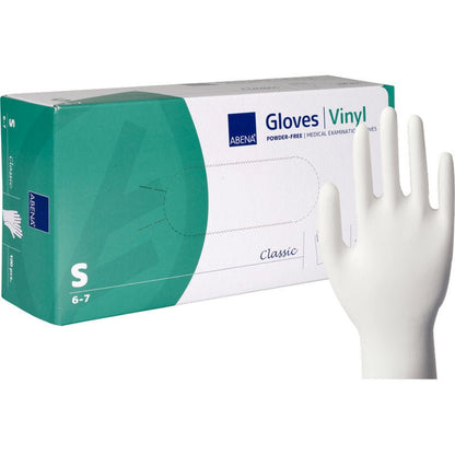 Uma caixa de luvas de vinil Classic da Abena Re-Seller GmbH, sem pó e transparente no tamanho pequeno, está ao lado de uma única luva branca em pé. A caixa é verde e branca e mostra informações do produto.
