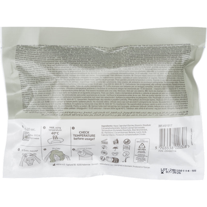 Na parte de trás da touca de champô Abena Re-Seller GmbH, ø 32 cm, Branca (1 peça) embalagem encontram-se instruções de uso, instruções de segurança, diretrizes de temperatura, gráficos em preto/cinza sobre branco, código de barras e instruções para lavar o cabelo sem água.