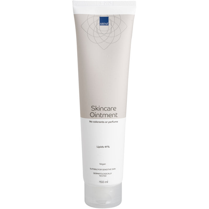 Eine beige-weiße 150 ml Tube Abena Re-Seller GmbH Hautpflegesalbe, Karton (12 Packungen), zeichnet sich durch natürliche Inhaltsstoffe, keine Farbstoffe oder Parfüm, 41% Lipide, vegane Formel, dermatologisch getestet für trockene Haut aus.