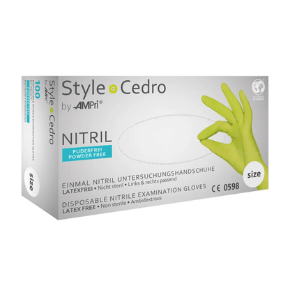 Caixa de luvas de nitrilo AMPri STYLE CEDRO sem pó da MED-COMFORT, luvas de exame descartáveis verdes em nitrilo, tamanho médio, sem látex, não estéreis, utilizáveis em ambas as mãos e sem pó. A caixa mostra uma mão enluvada com um sinal de "OK" e detalhes do produto em alemão (luvas de nitrilo sem pó) e inglês.
