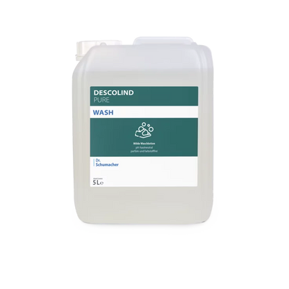Ein 5-Liter-Behälter der Dr. Schumacher Descolind Pure Wash Waschlotion der Dr. Schumacher GmbH aus klarem Kunststoff mit einem teal-weißen Etikett, auf dem eine Ikone mit gewaschenen Händen abgebildet ist; diese Waschlotion ist parfümfrei.